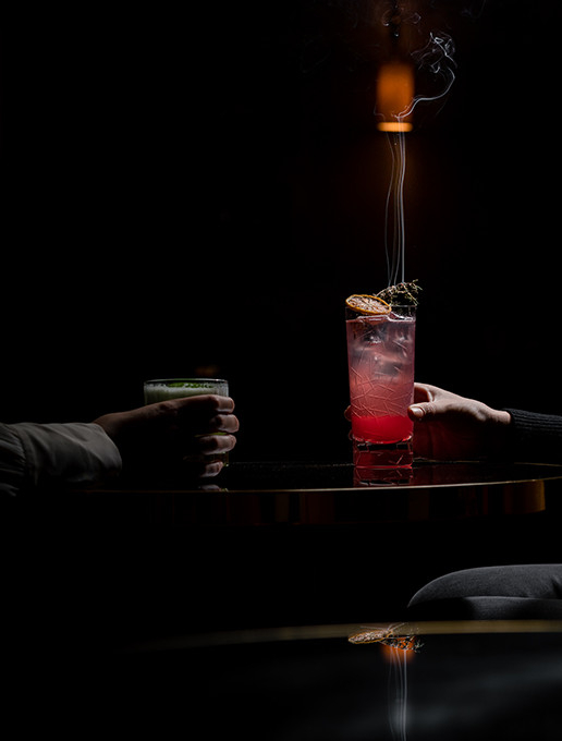 Married couple toasting to their wedding anniversary at Dans le Noir ?