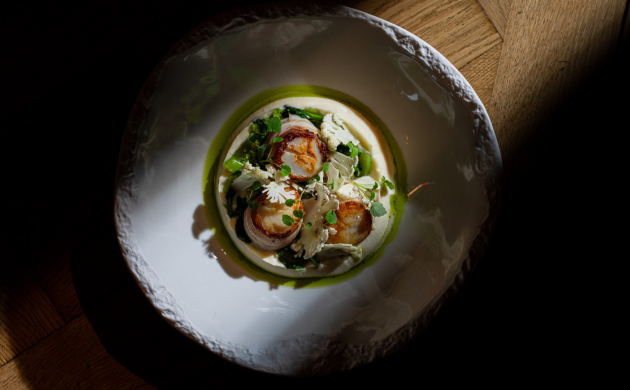 A white plate with a vessel of light